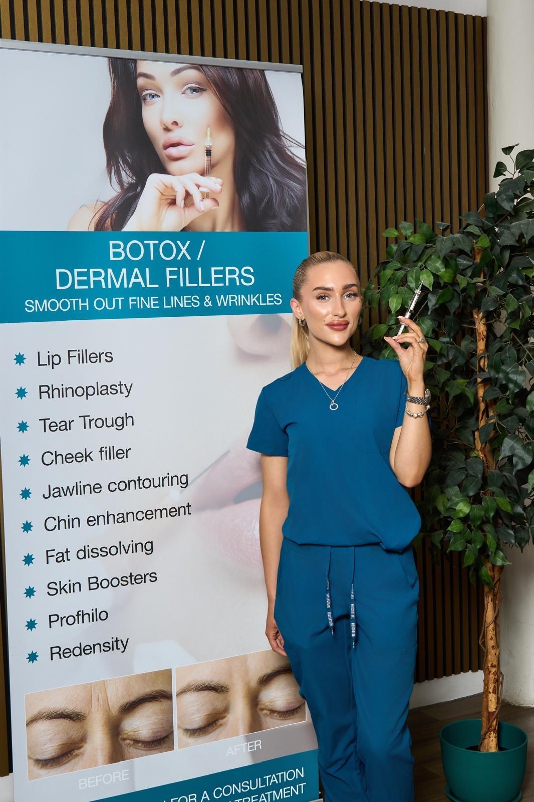 Derma Cosmedic aesthetic practitioner in teal scrubs holding a treatment syringe next to a dermal fillers and skin boosters banner listing lip fillers, tear trough, cheek filler, jawline contouring, chin enhancement, fat dissolving, skin boosters, Profhilo and Redensity treatments